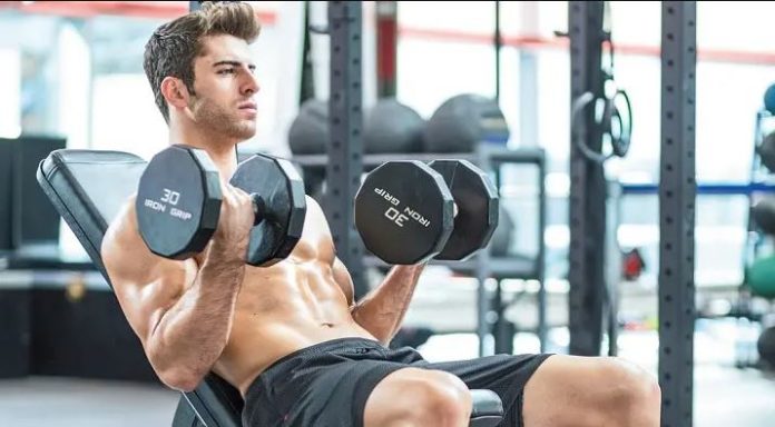 BICEPS CURL INCLINED WITH DUMBBELLS